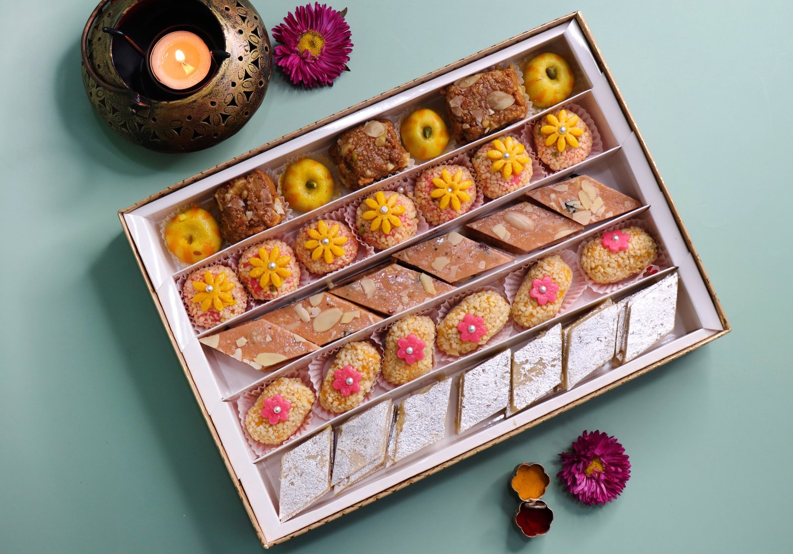 Elegant gift box filled with assorted Indian mithai